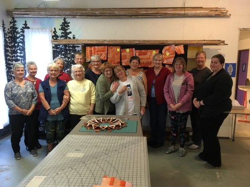 The GEM quilters after piecing their first improv block. Diane was weak from the stress of random cutting and piecing.