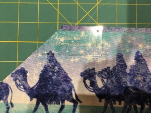 Mark the inner corner of the mitered border 