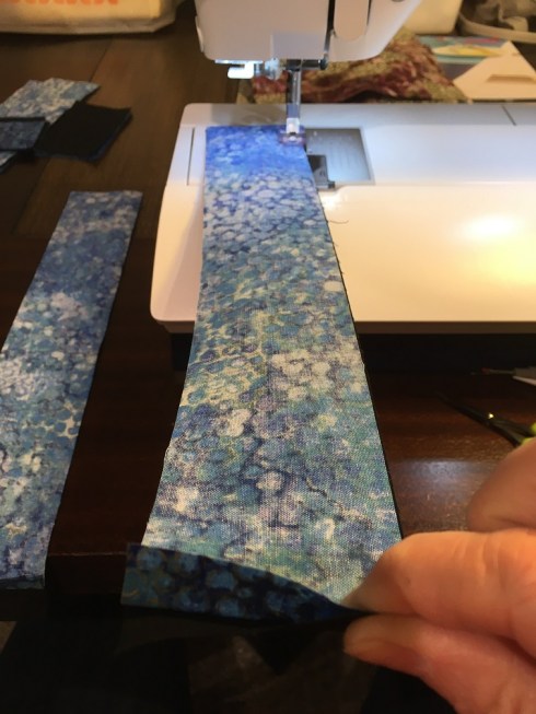 I'm holding my 15" strip so that the 2 strips are aligned at the far end