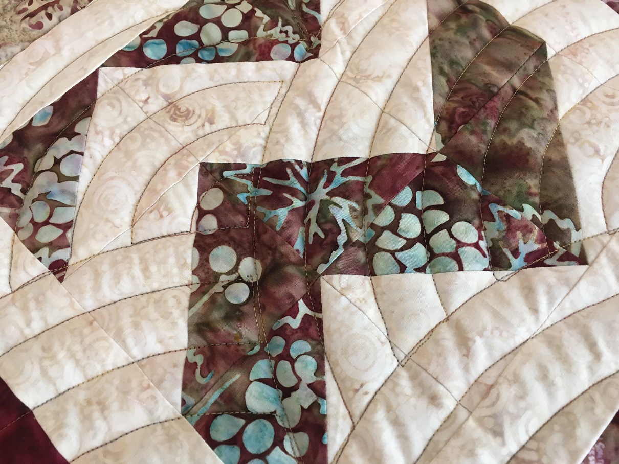 The variegated thread matches nicely with the prints.