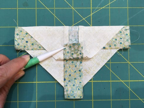 The 2 colored strips are stacked so that they are aligned.