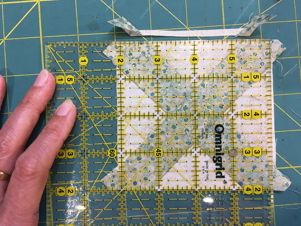 Align ruler with both v's for perfect placement