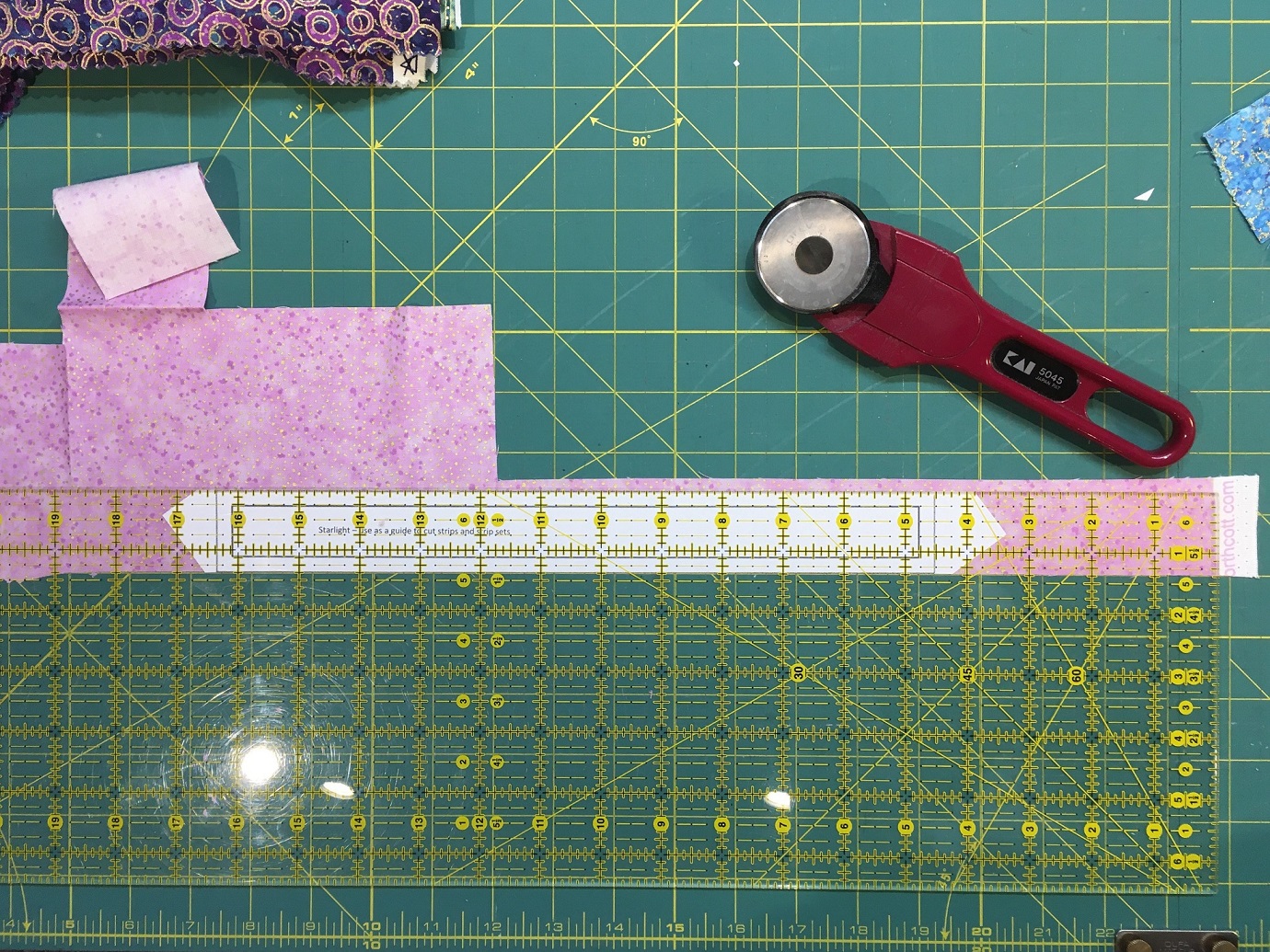 I taped my cutting template to the underside of my ruler