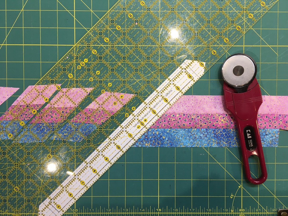 I used the template to cut my strip sets into segments