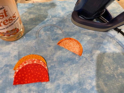 A spritz of sizing helps set the crisp smooth curved edge